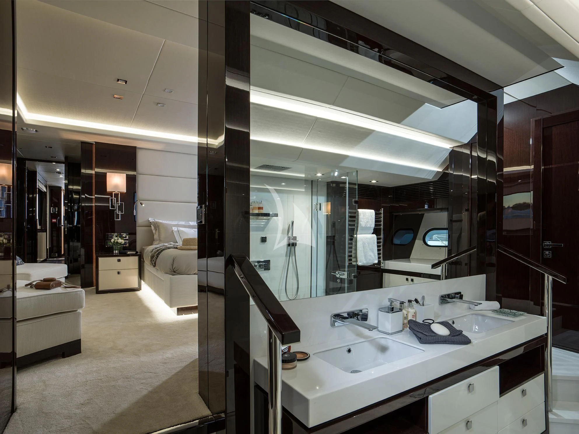 a bathroom with a sink and a mirror aboard FLEUR Yacht for Charter