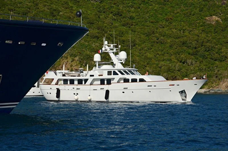 a boat docked at a pier aboard HAIMA Yacht for Sale