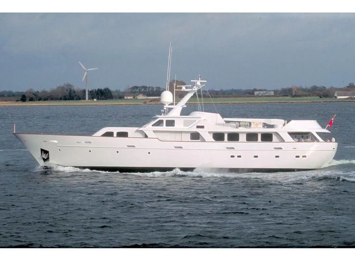 a white yacht in the water aboard HAIMA Yacht for Sale