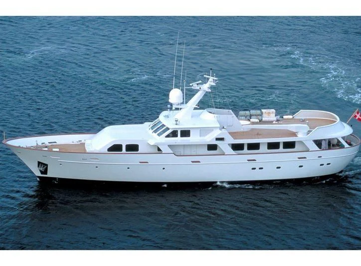 a white yacht in the ocean aboard HAIMA Yacht for Sale