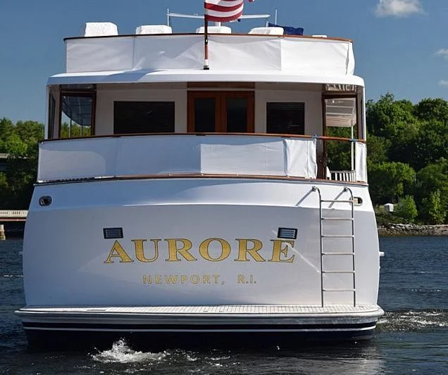 a white and black boat aboard AURORE Yacht for Sale