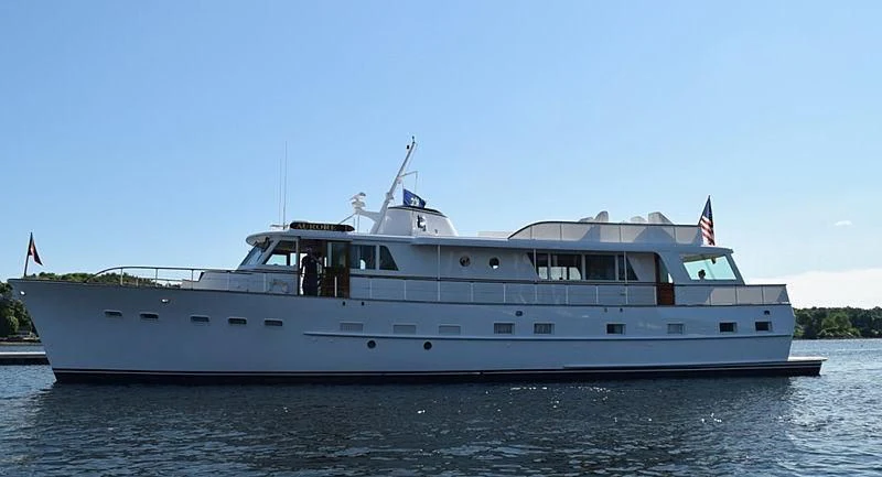 a large white boat on the water aboard AURORE Yacht for Sale