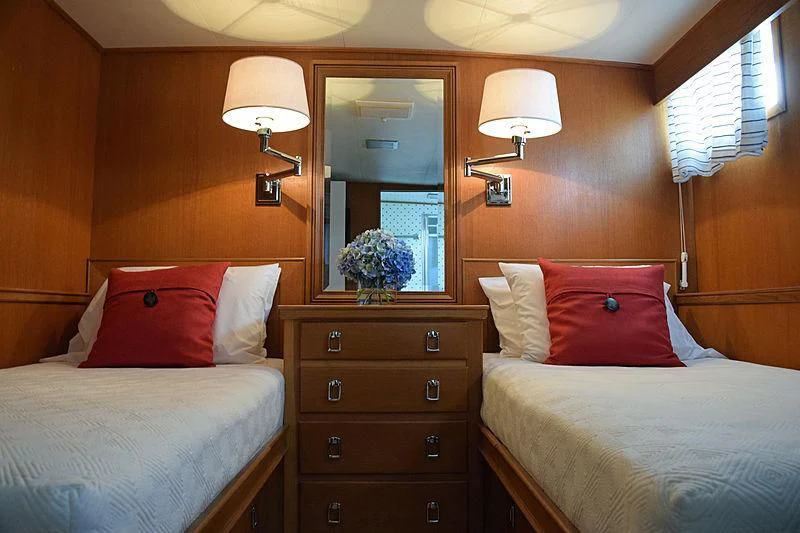 a couple of beds in a hotel room aboard AURORE Yacht for Sale
