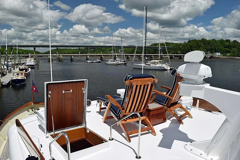 a boat with chairs on it aboard AURORE Yacht for Sale