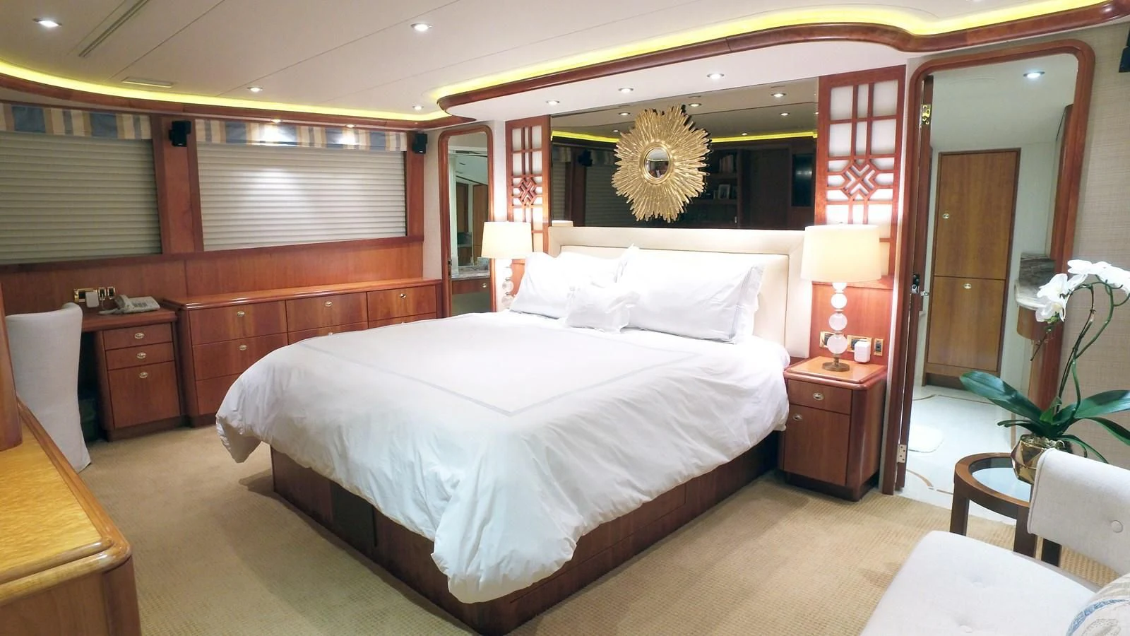 a large bedroom with a large bed aboard ELYSIAN Yacht for Sale
