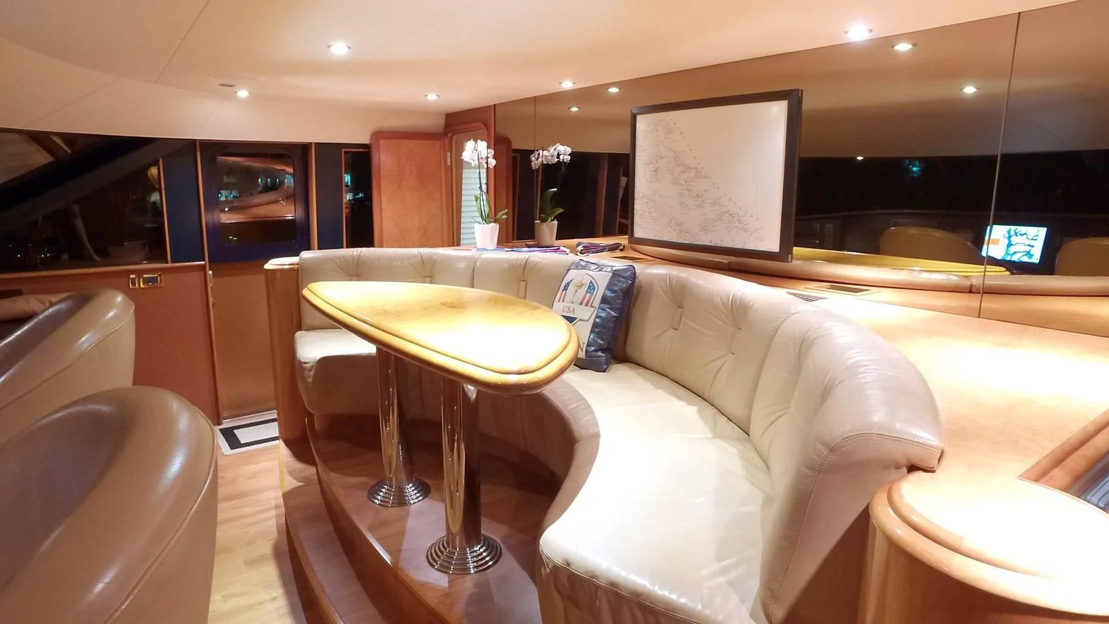 a room with a table and chairs aboard ELYSIAN Yacht for Sale