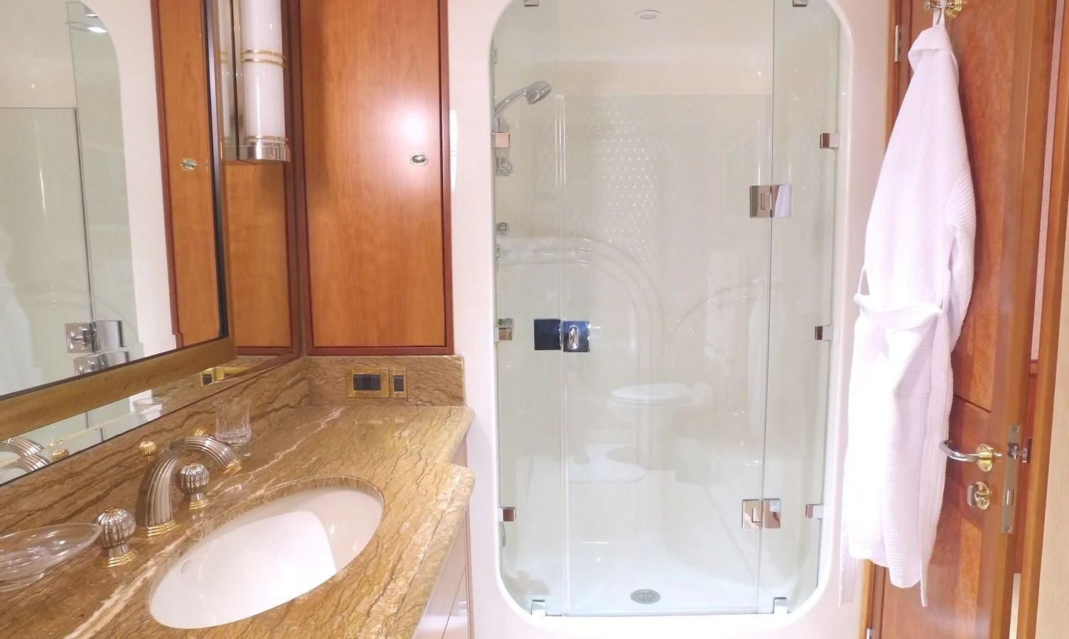 a bathroom with a shower and sink aboard ELYSIAN Yacht for Sale