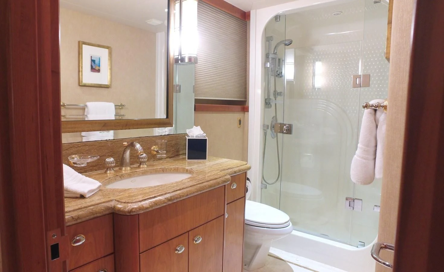 a bathroom with a sink and a shower aboard ELYSIAN Yacht for Sale