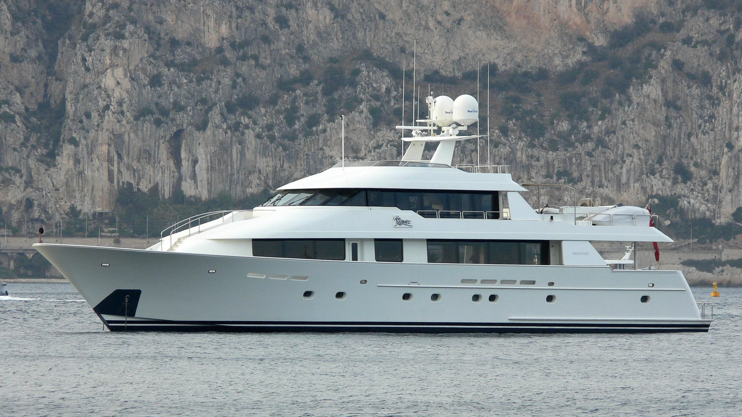 a white yacht in the water aboard ELYSIAN Yacht for Sale