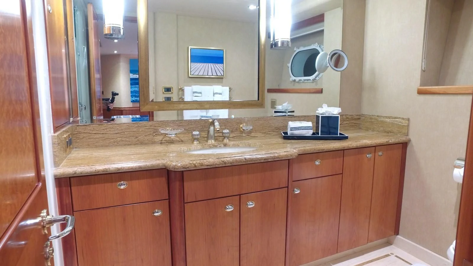 a bathroom with a countertop sink and cabinets aboard ELYSIAN Yacht for Sale