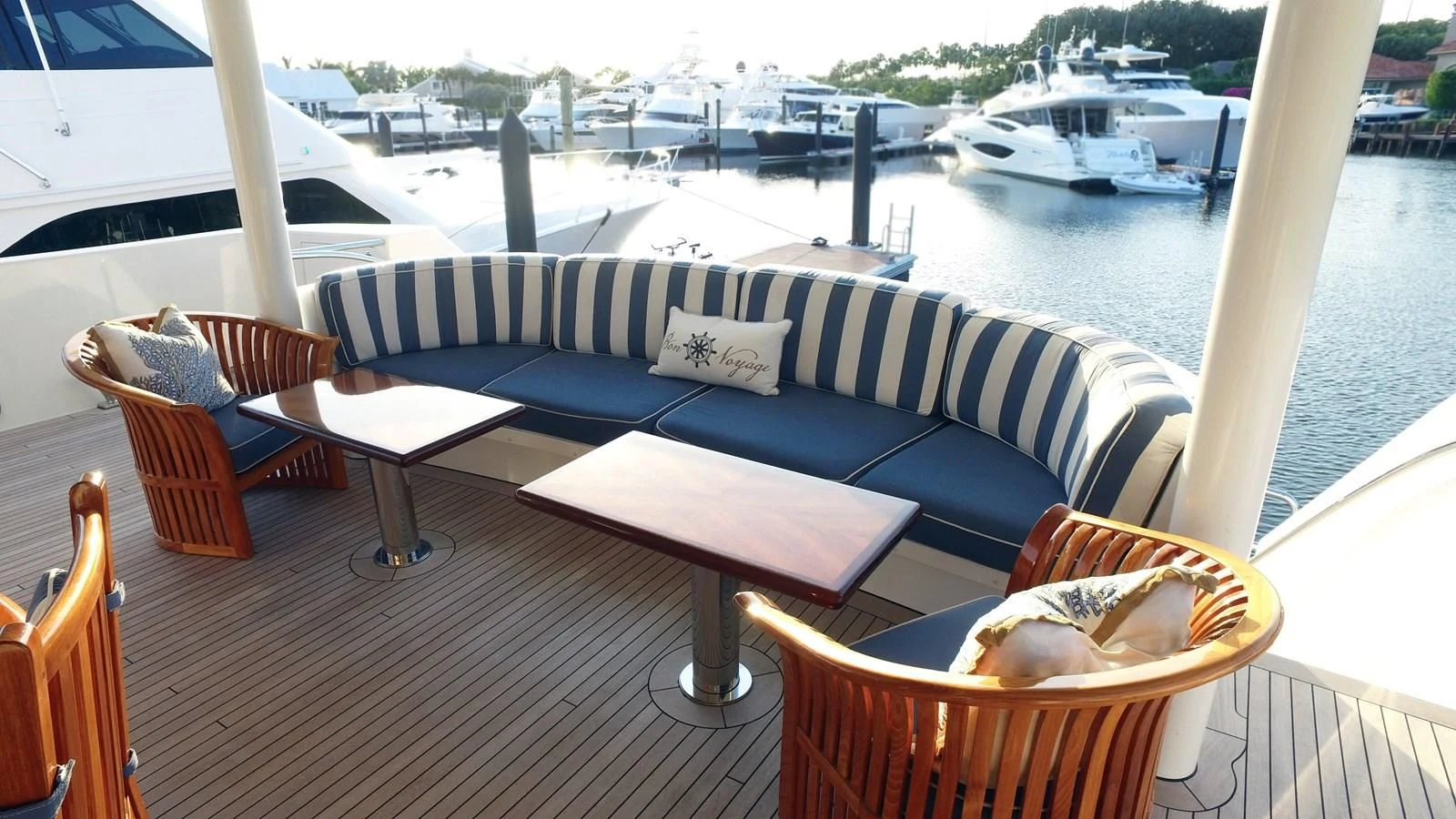 a table and chairs on a boat aboard ELYSIAN Yacht for Sale