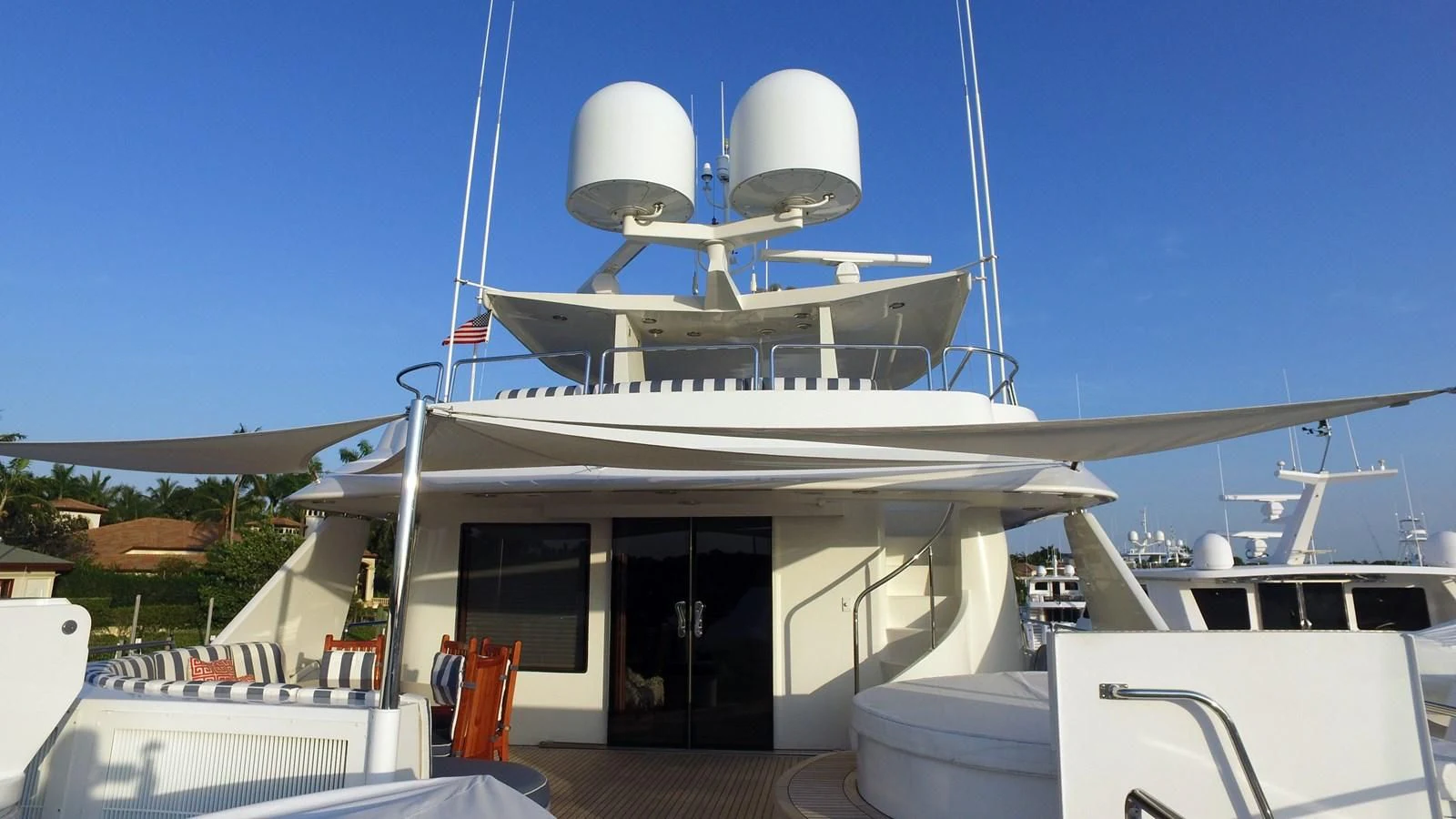 a boat on a dock aboard ELYSIAN Yacht for Sale