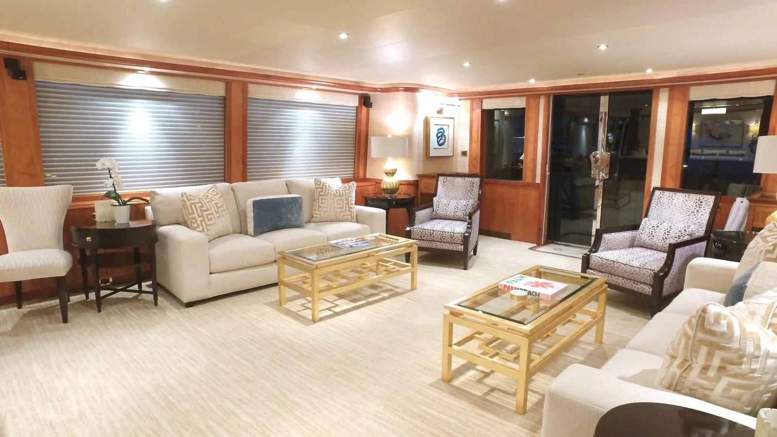 a living room with a couch and a coffee table aboard ELYSIAN Yacht for Sale