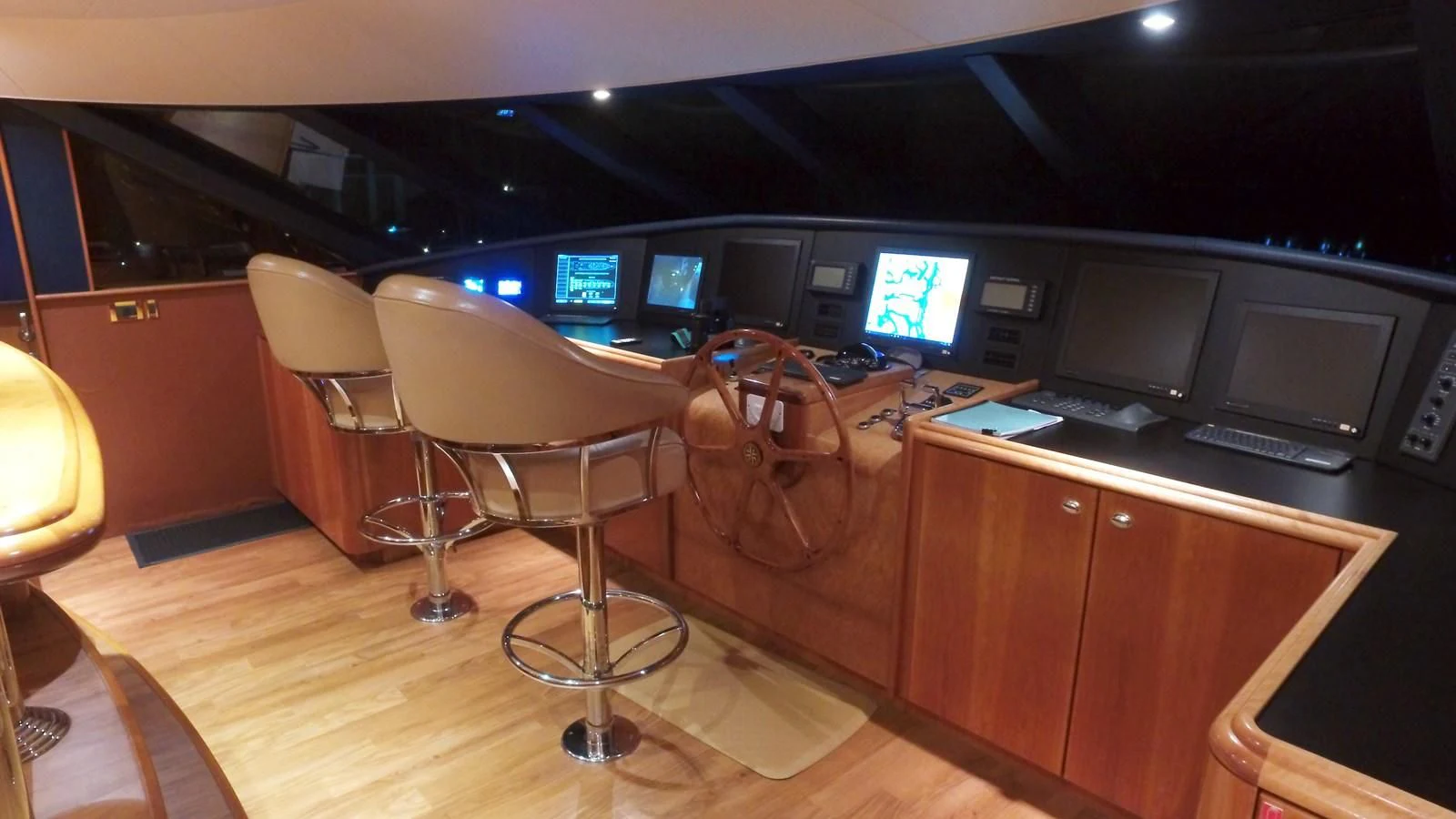 a room with a desk and chairs aboard ELYSIAN Yacht for Sale