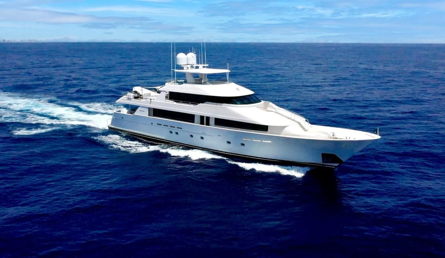 a white boat in the water aboard ELYSIAN Yacht for Sale