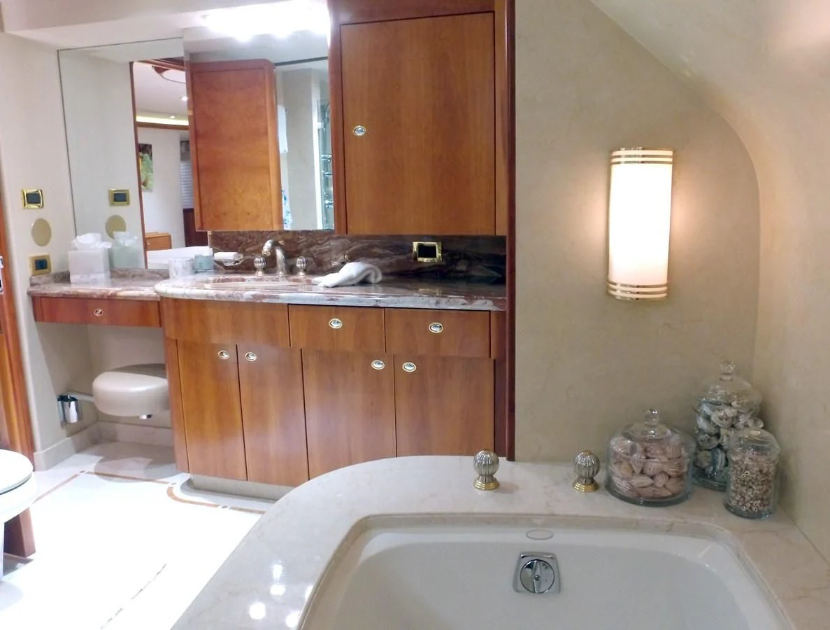 a bathroom with a sink and a toilet aboard ELYSIAN Yacht for Sale