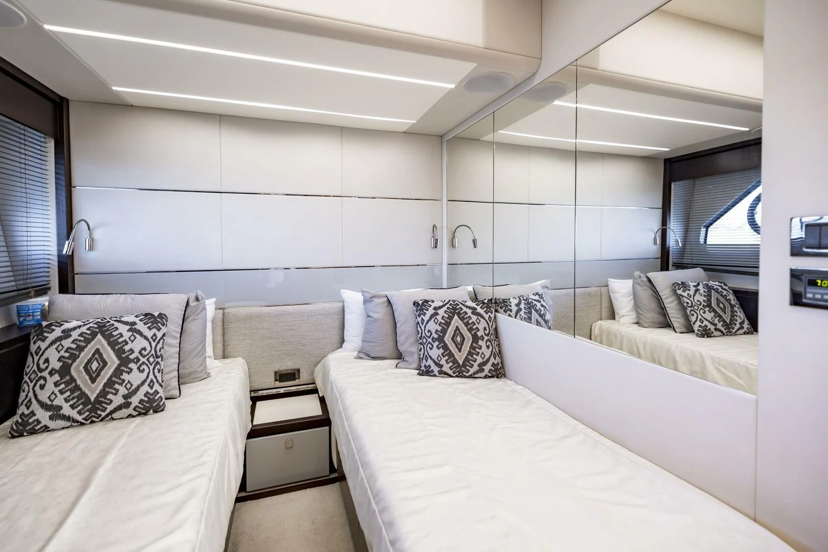 a room with two beds aboard H Yacht for Sale