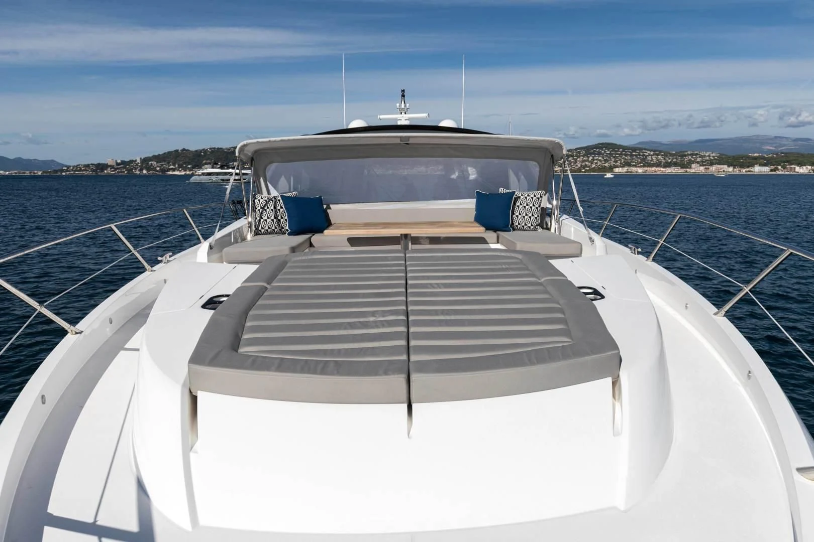 a boat on a dock aboard H Yacht for Sale