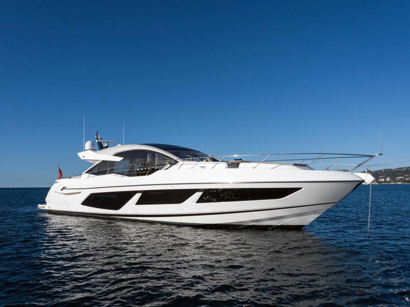 a white yacht on the water aboard H Yacht for Sale