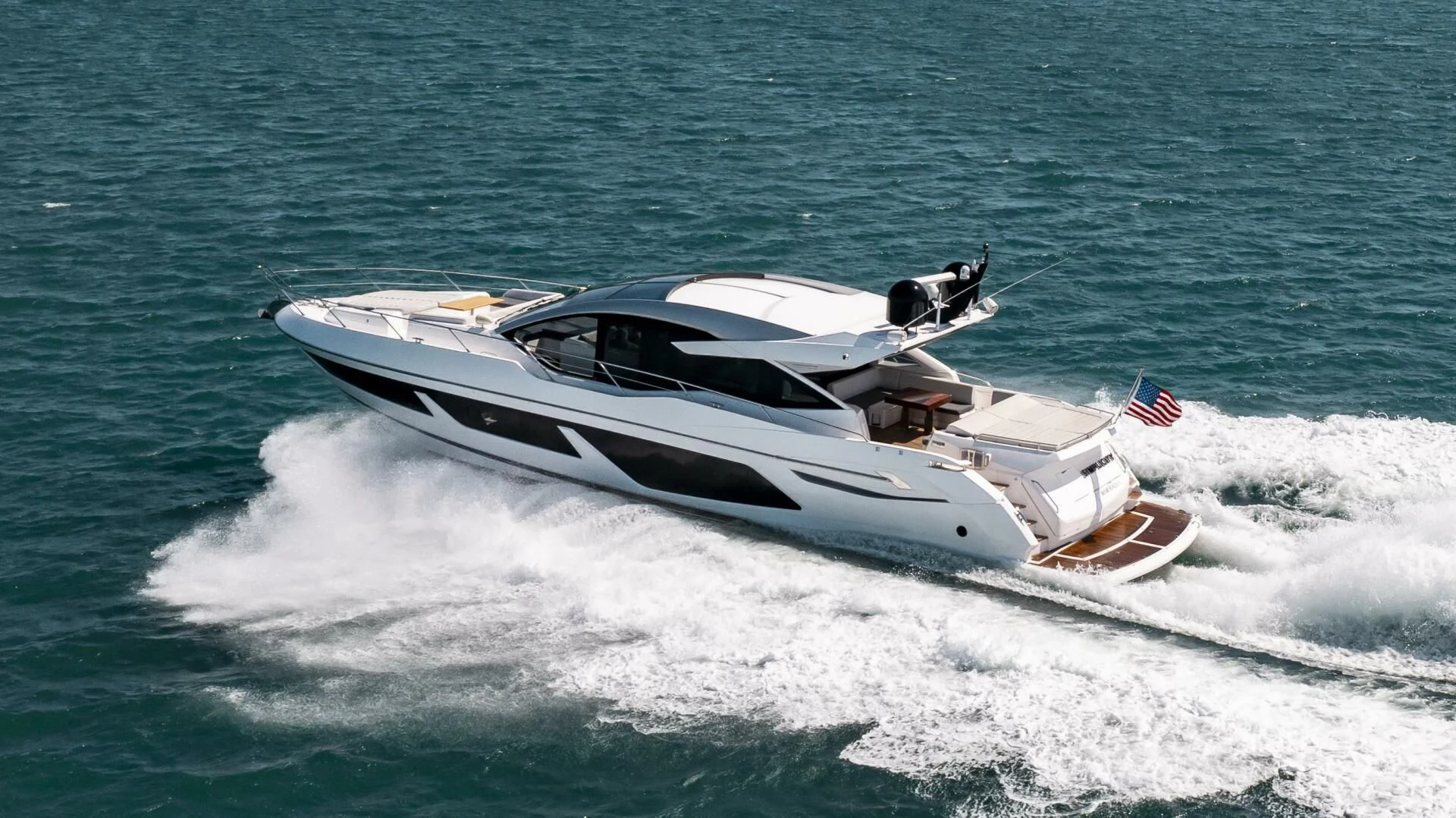 a boat on the water aboard H Yacht for Sale