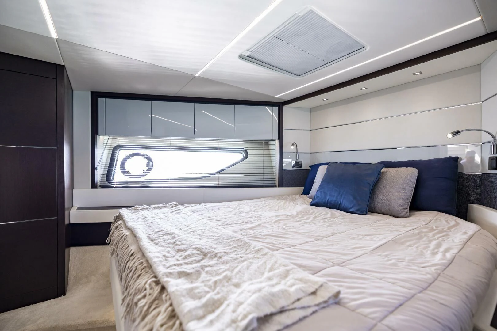 a bed in a room aboard H Yacht for Sale