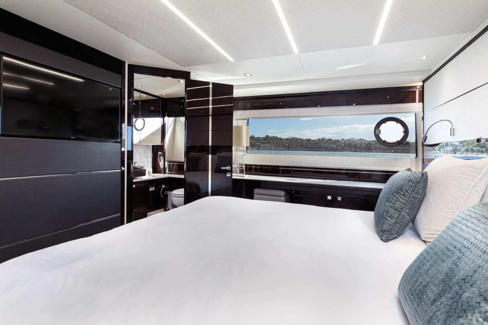 a bed in a room aboard H Yacht for Sale