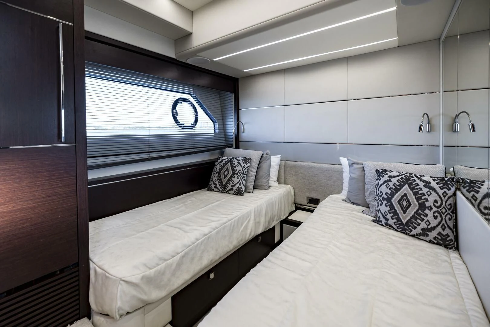 a room with two beds aboard H Yacht for Sale