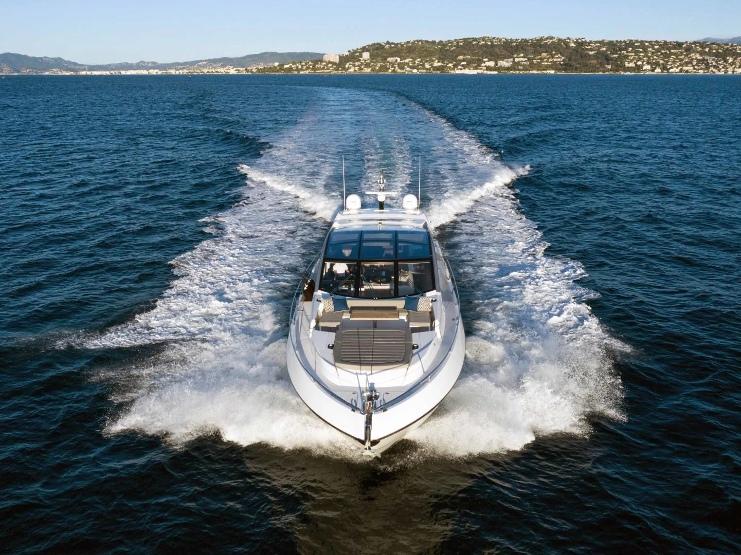 a boat on the water aboard H Yacht for Sale