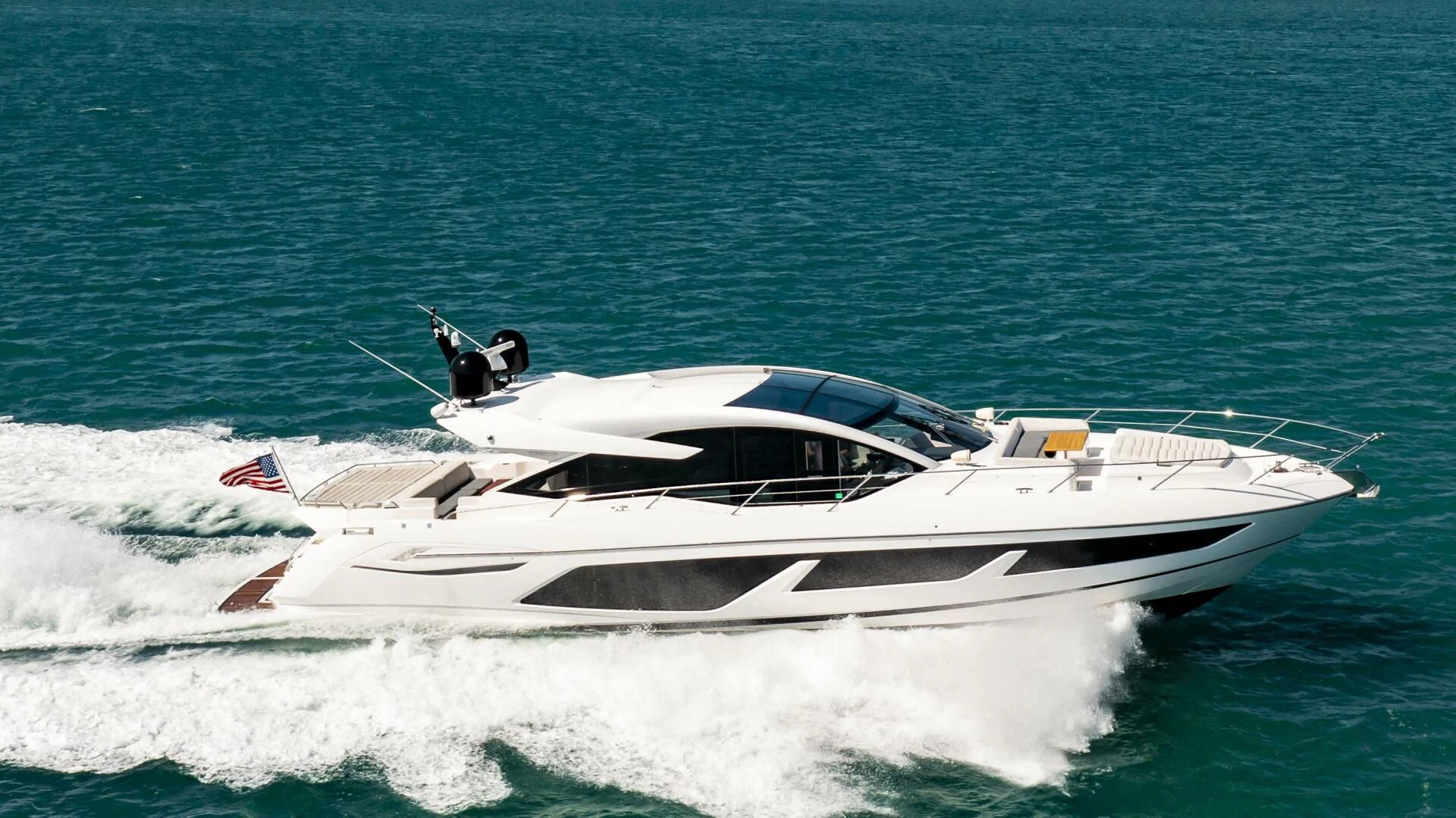 a white yacht in the water aboard H Yacht for Sale