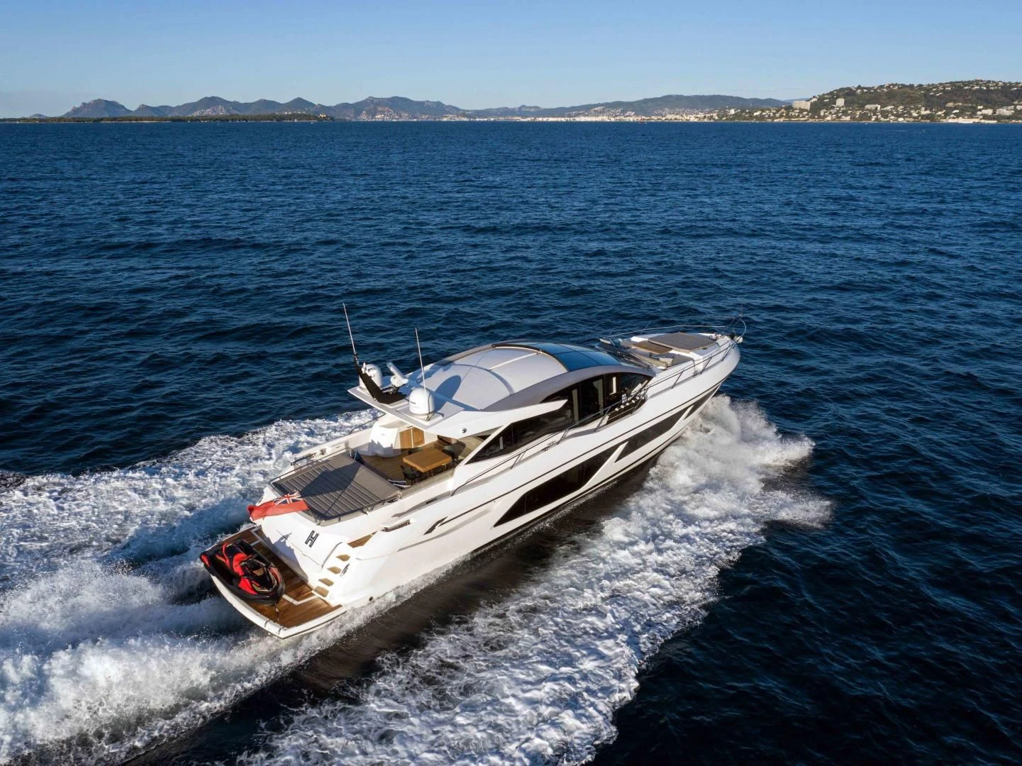 a boat on the water aboard H Yacht for Sale