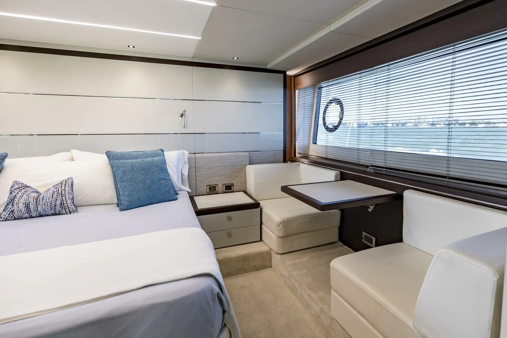 a room with a bed and a desk aboard H Yacht for Sale