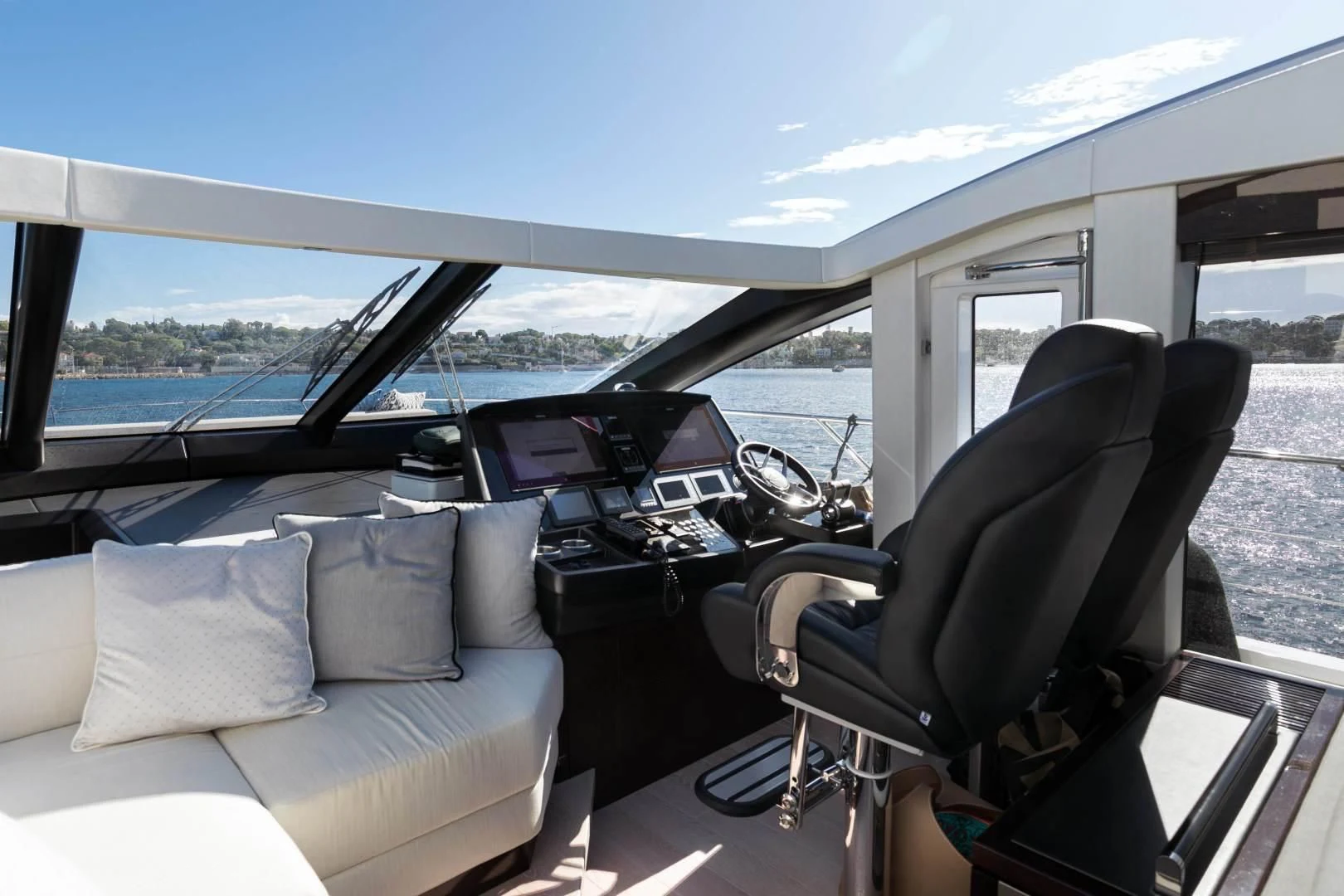 inside of a car aboard H Yacht for Sale