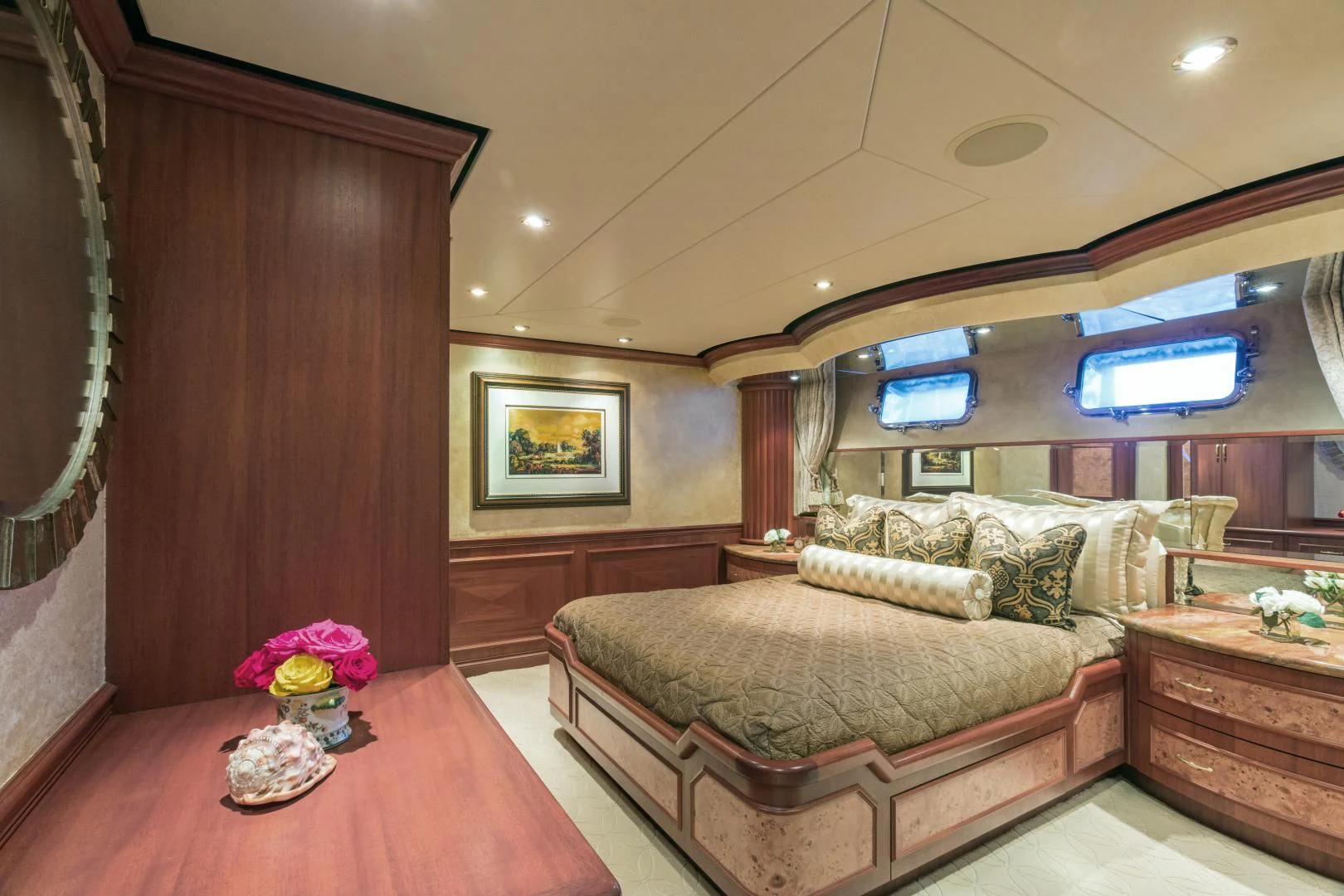 a living room with a couch and a table aboard SHOGUN Yacht for Sale