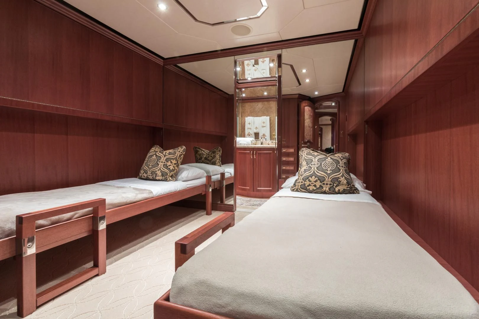 a couple of beds in a room aboard SHOGUN Yacht for Sale