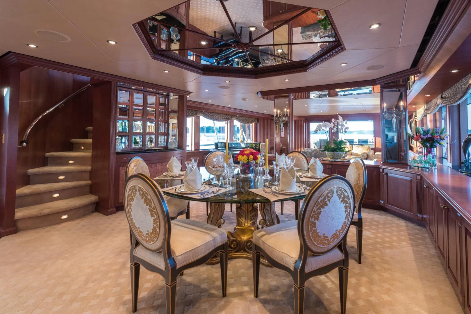 a large kitchen with a dining table aboard SHOGUN Yacht for Sale