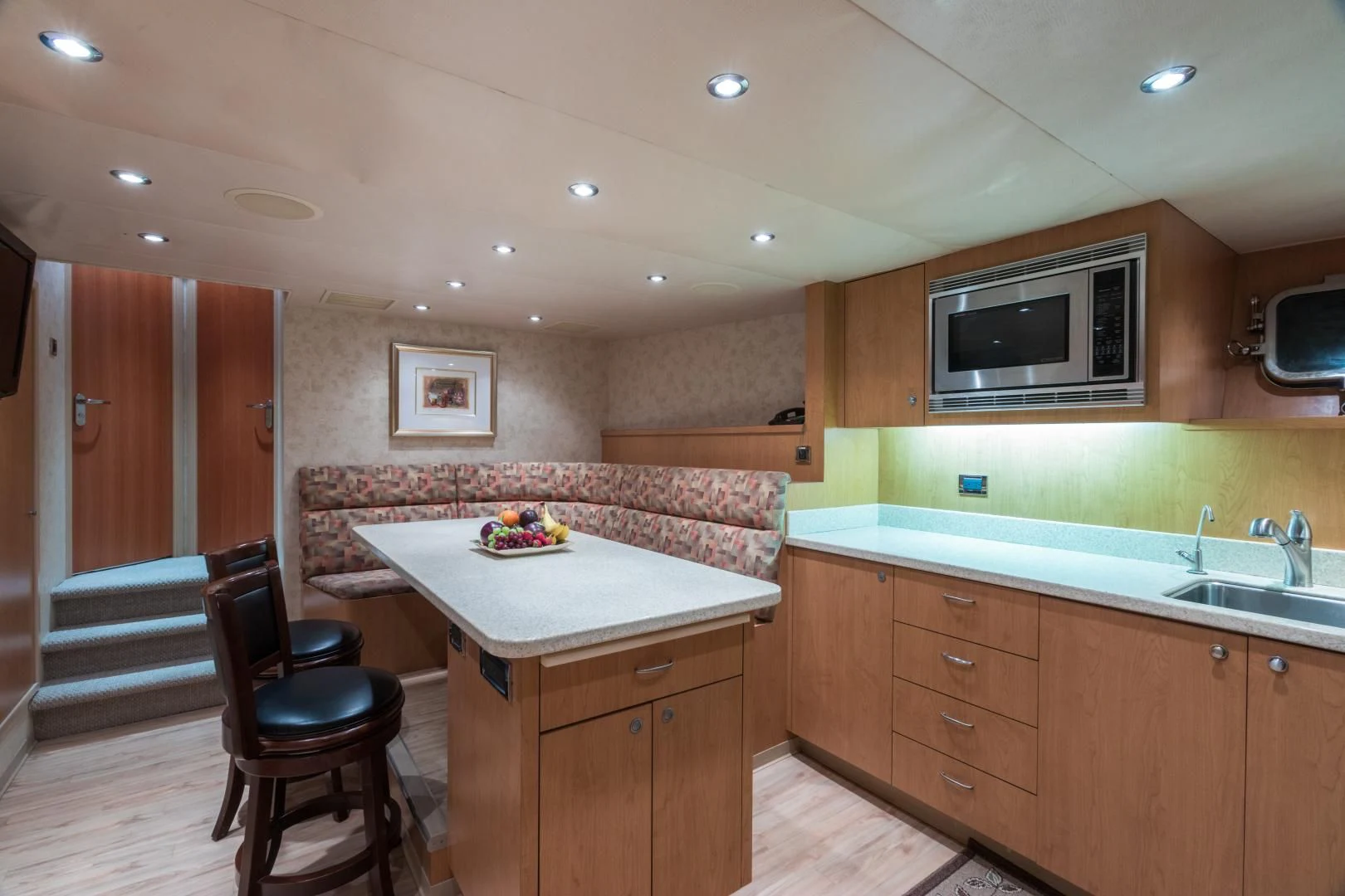 a kitchen with a microwave oven aboard SHOGUN Yacht for Sale