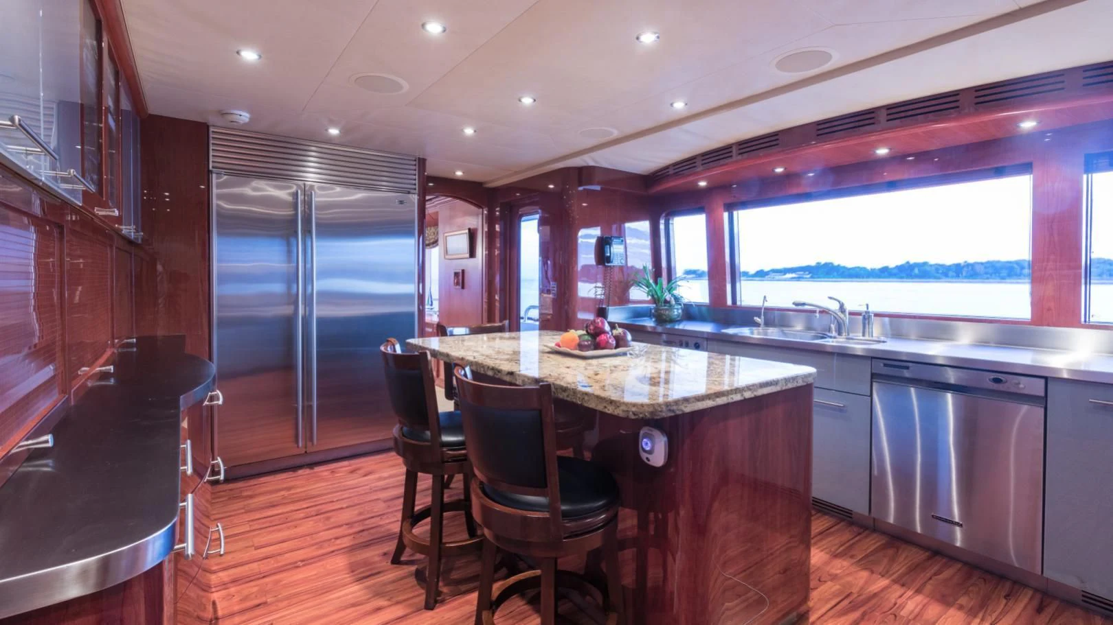 a kitchen with a large island aboard SHOGUN Yacht for Sale