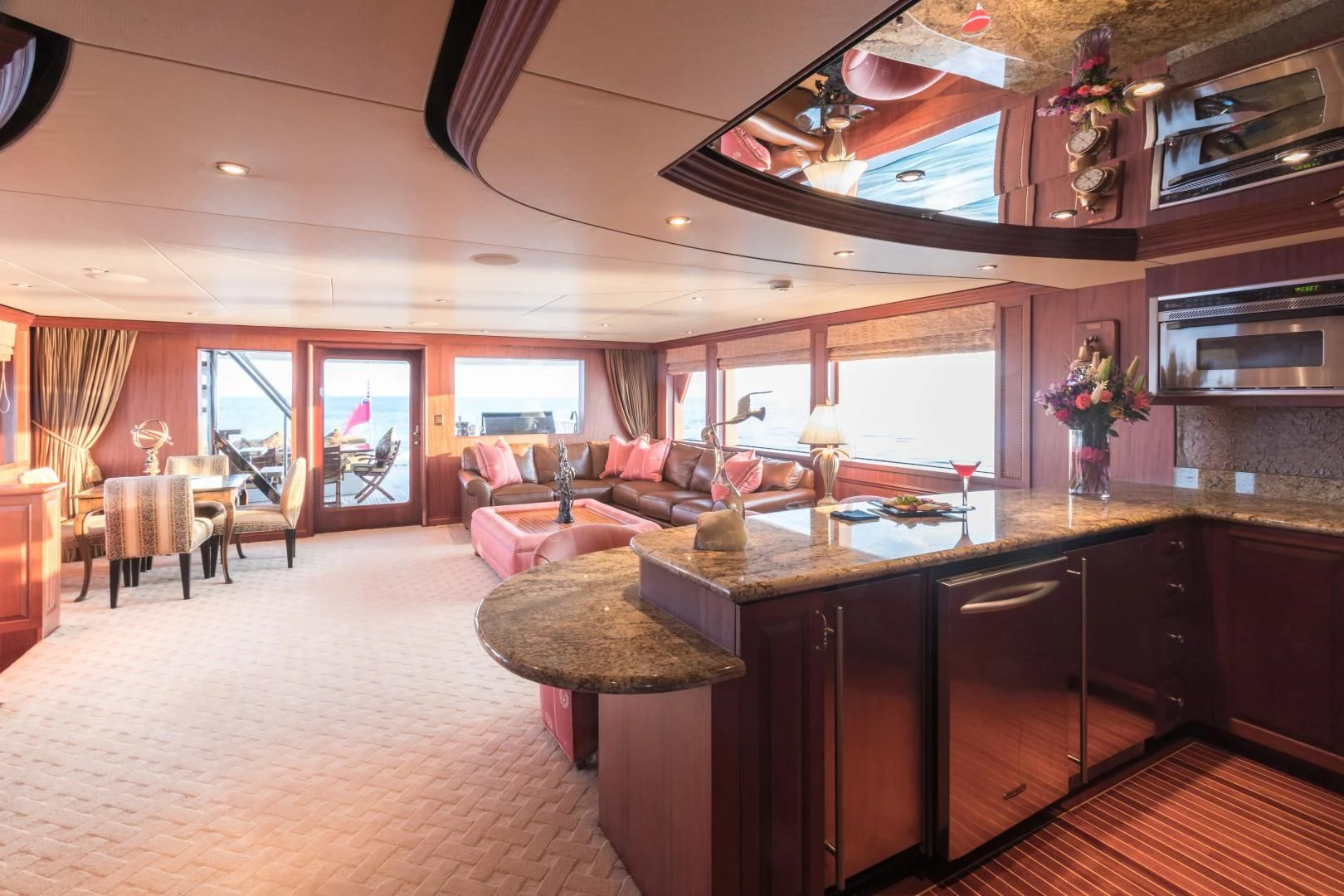 a large kitchen and living room aboard SHOGUN Yacht for Sale