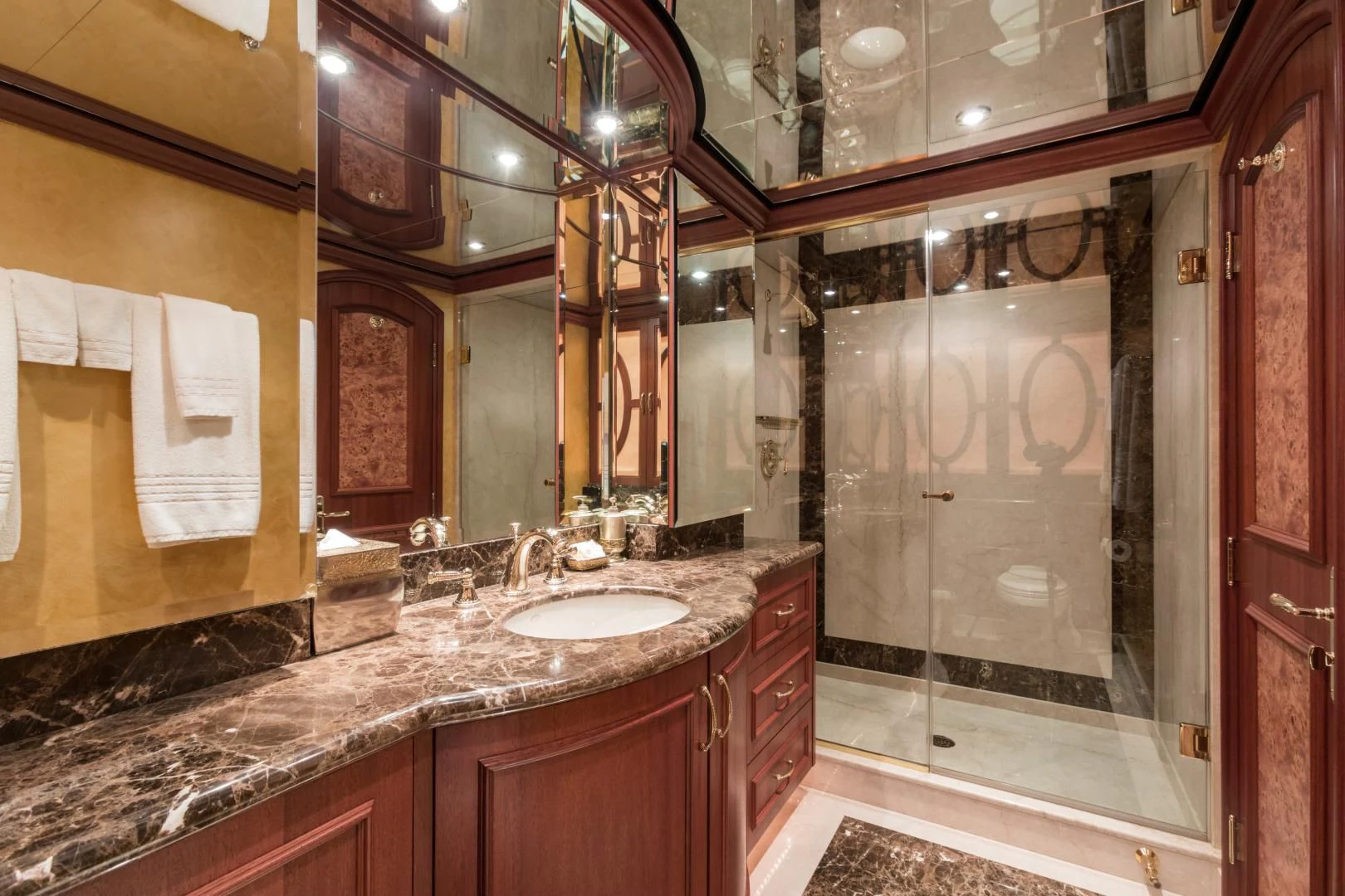 a bathroom with marble counter tops aboard SHOGUN Yacht for Sale