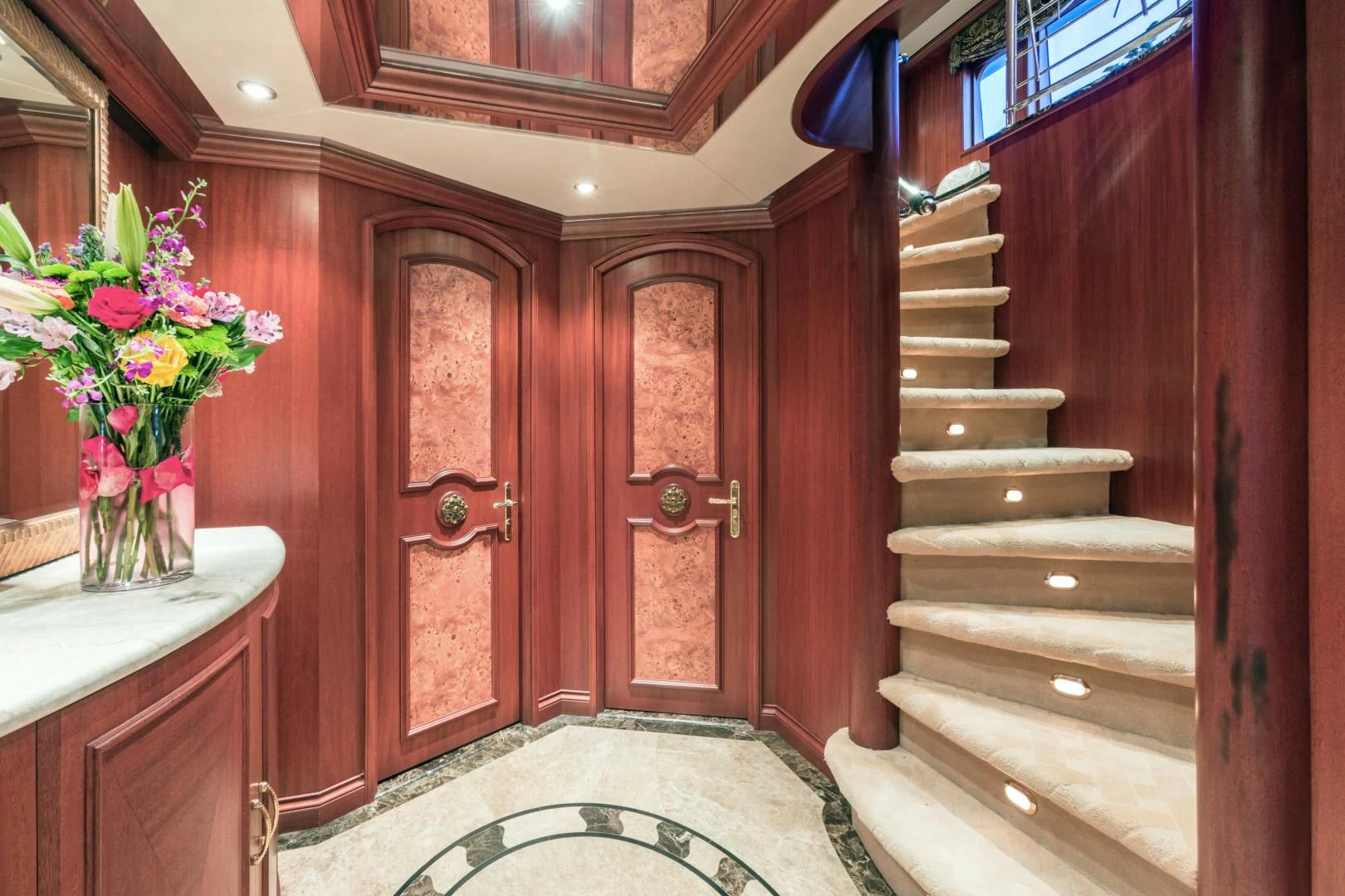 a door with a flower vase on the door aboard SHOGUN Yacht for Sale