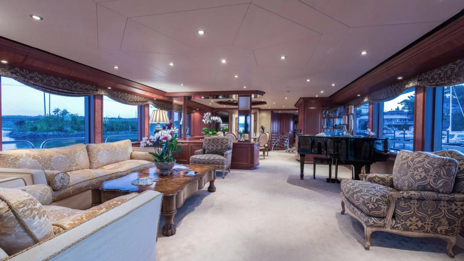 a living room with a large window aboard SHOGUN Yacht for Sale