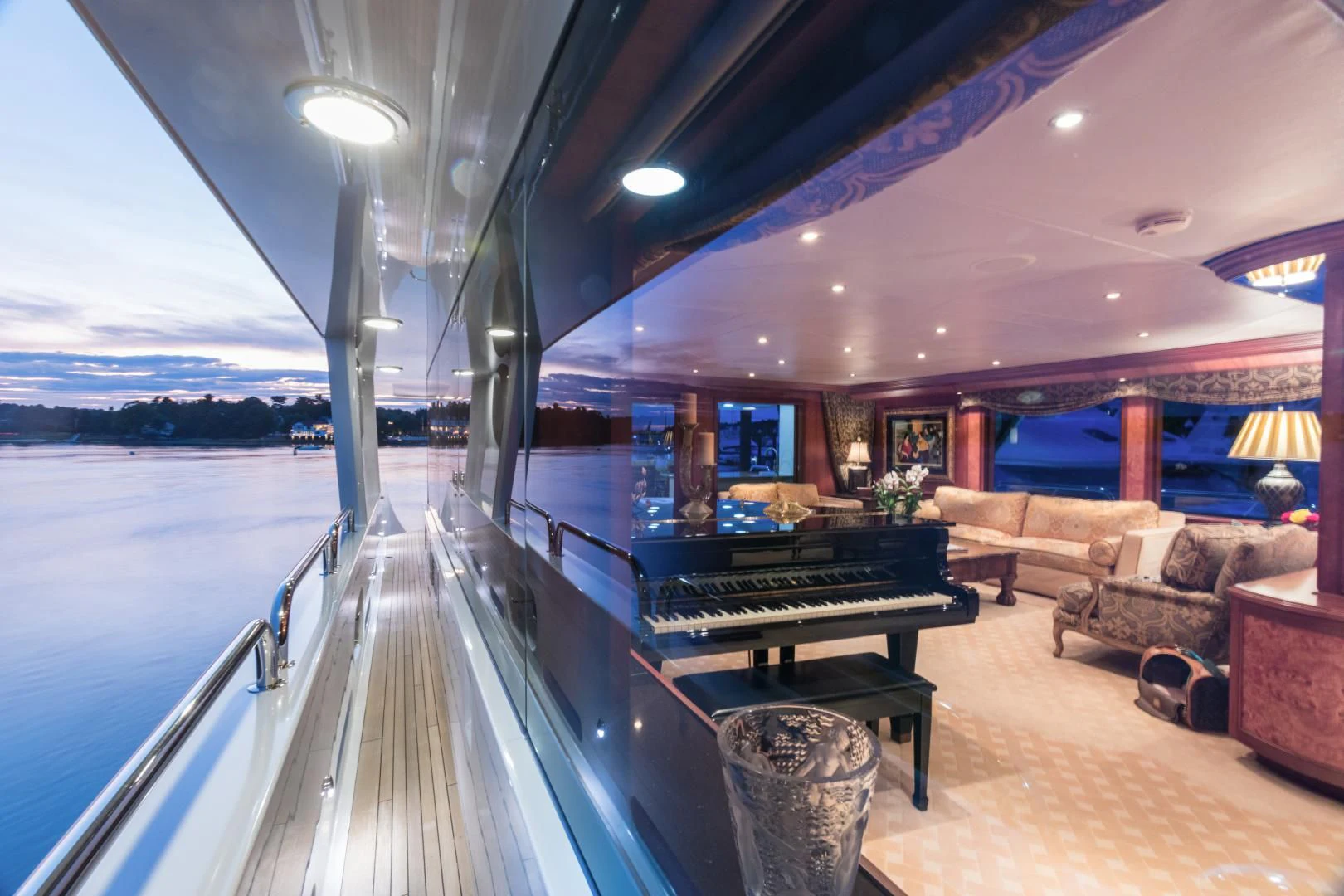 a large room with a pool table and couches aboard SHOGUN Yacht for Sale