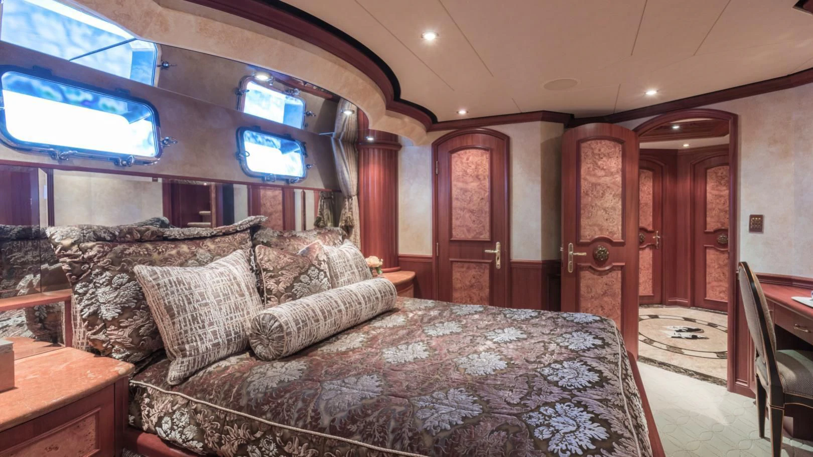 a large bed in a room aboard SHOGUN Yacht for Sale