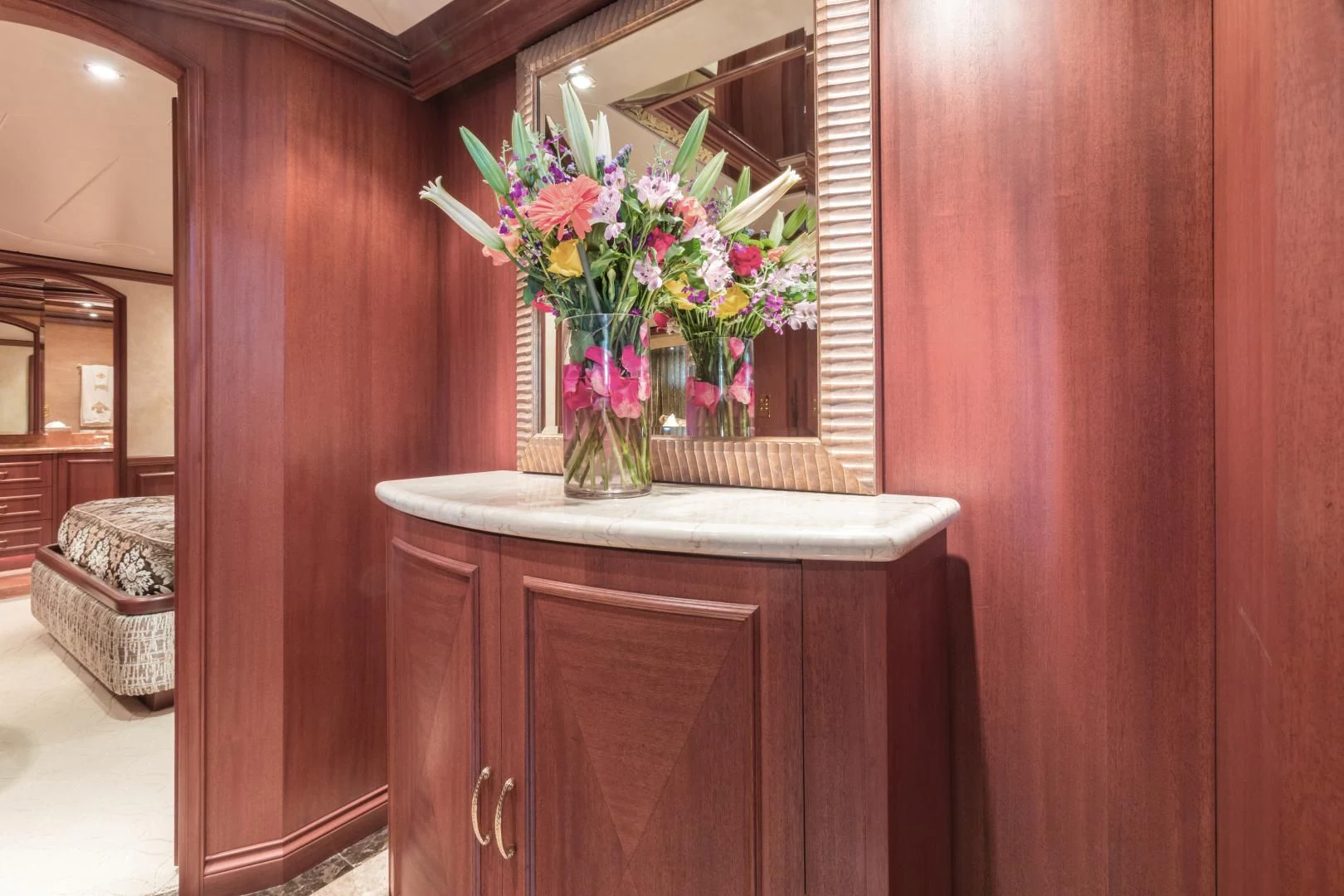 a vase of flowers on a table aboard SHOGUN Yacht for Sale