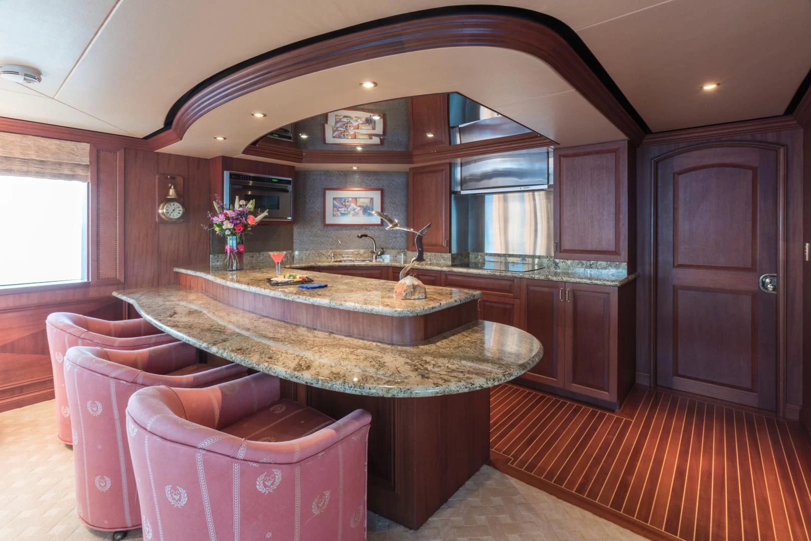 a large kitchen with a marble counter aboard SHOGUN Yacht for Sale
