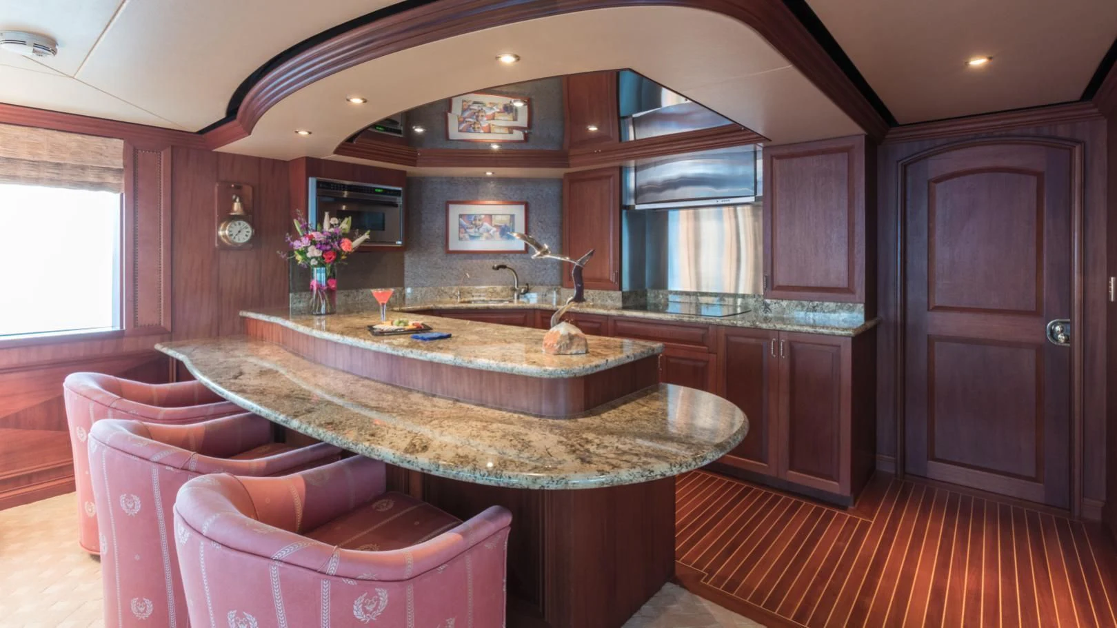a large kitchen with a marble counter aboard SHOGUN Yacht for Sale