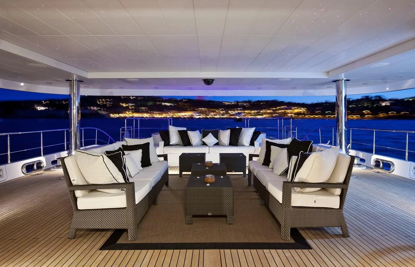 a room with couches and a table aboard BELLA 2 Yacht for Sale