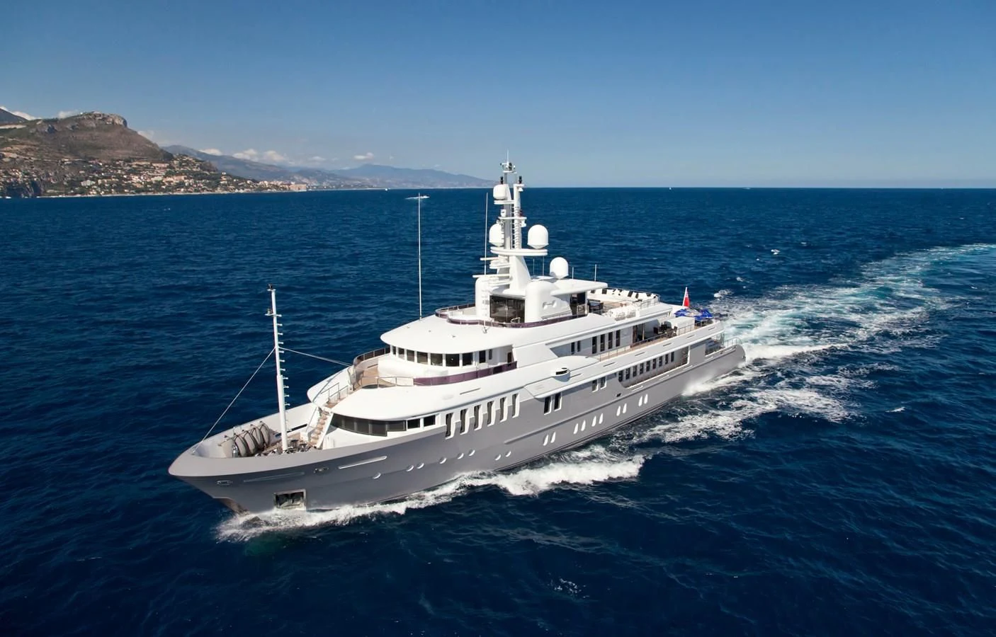 a large white boat on the water aboard BELLA 2 Yacht for Sale
