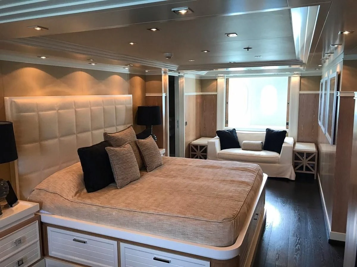 a large bedroom with a bed aboard BELLA 2 Yacht for Sale