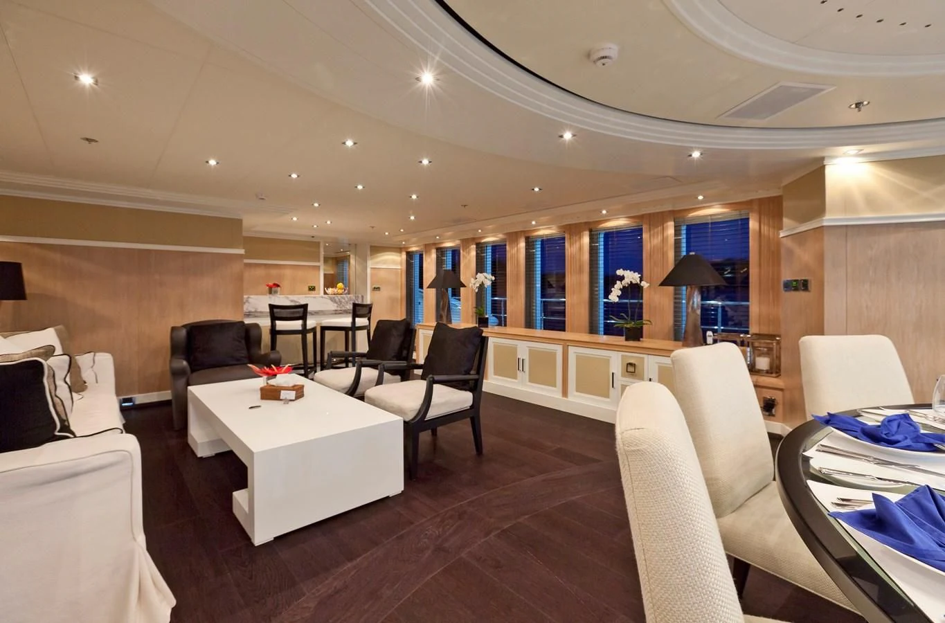 a living room with a table and chairs aboard BELLA 2 Yacht for Sale